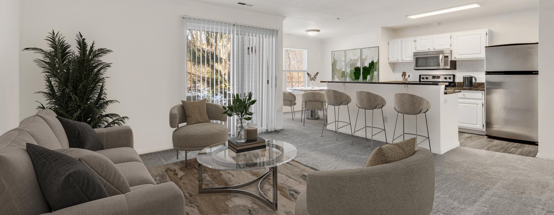 a living room with a couch and chairs